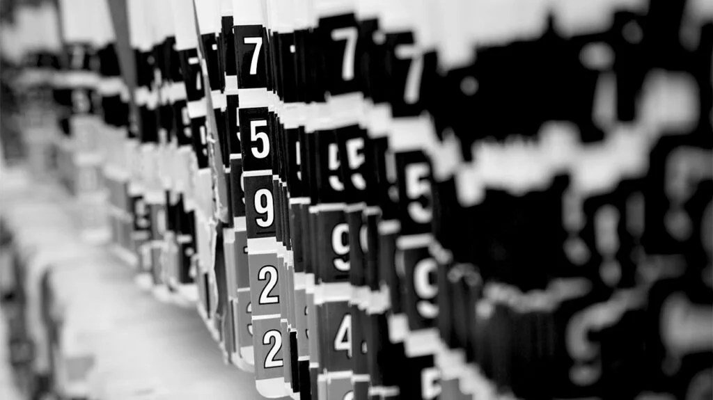 A cognitive test for dementia with a series of cards with numbers on them.